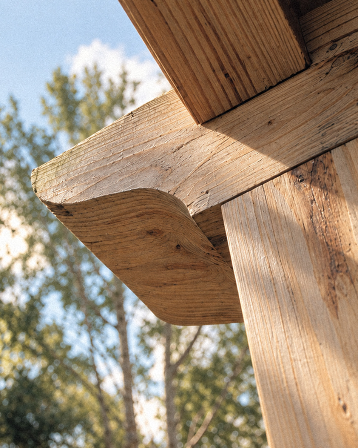 Sunlit timber detail at The Old Workshop